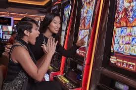Mobile phone displaying live roulette table interface